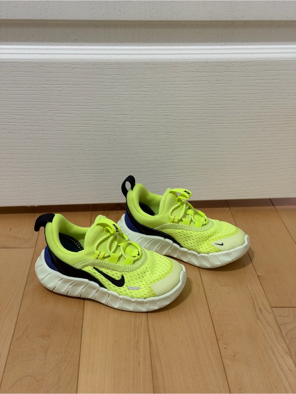 Nike Kids Neon Yellow and Black Slip-On Sneakers
